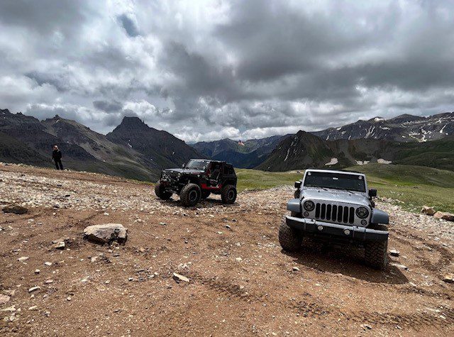 2 cars in the mountains